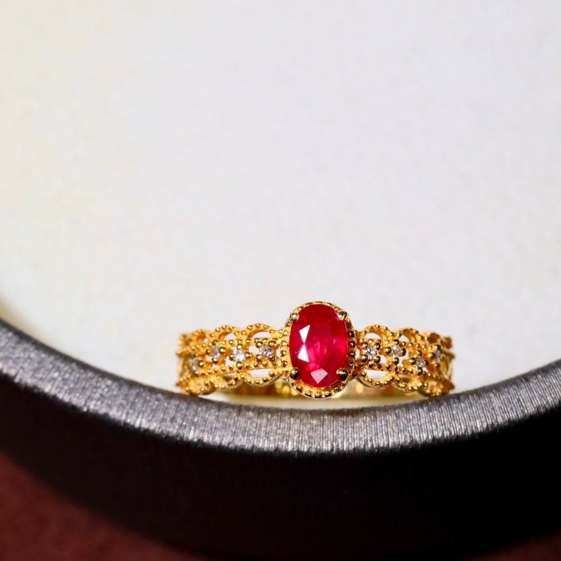 14k Gold 0.44 Ctw Natural Ruby & Diamond Ring: Ref:231120391 // gold content:14k gold // ring size:7. 25us // // main gemstone:ruby // shape:oval // carat weight:0. 41ct // color:red // treatment:natural // // adjacent gemstone 2 : diamond //