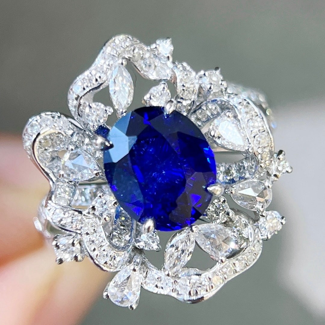 14k Gold 2.73 Ctw Natural Sapphire & Diamond Ring: Ref:231120401 // gold content:14k gold // ring size:7. 25us // // main gemstone:sapphire // shape:oval // carat weight:1. 95ct // color:blue // treatment:natural // // adjacent gemstone 2 : diamond //