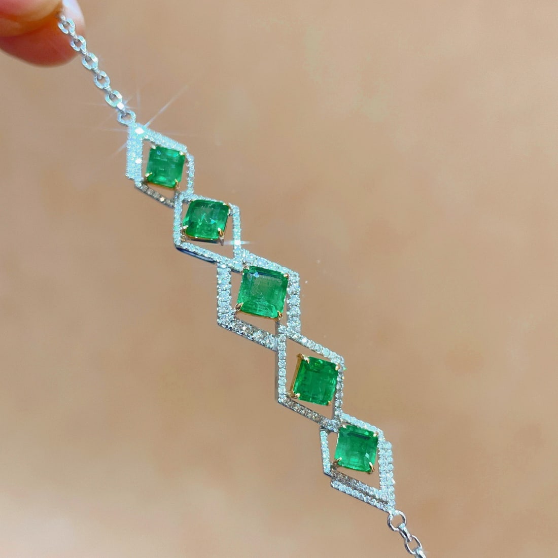 14k Gold 4.02 Ctw Natural Emerald & Diamond Bracelet: Ref:231120425 // gold content:14k gold // main gemstone:emerald // shape:octagonal // carat weight:3. 38ct // color:green // treatment:natural // // adjacent gemstone 2 : diamond // shape:round //