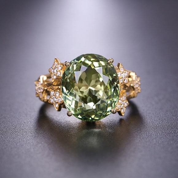 14k Gold 9.68 Ctw Natural Tourmaline & Diamond Ring: Ref:231117057 // gold content:14k gold // ring size:7. 25us // // main gemstone:tourmaline // shape:oval // carat weight:9. 4ct // color:green // treatment:natural // // adjacent gemstone 2 :