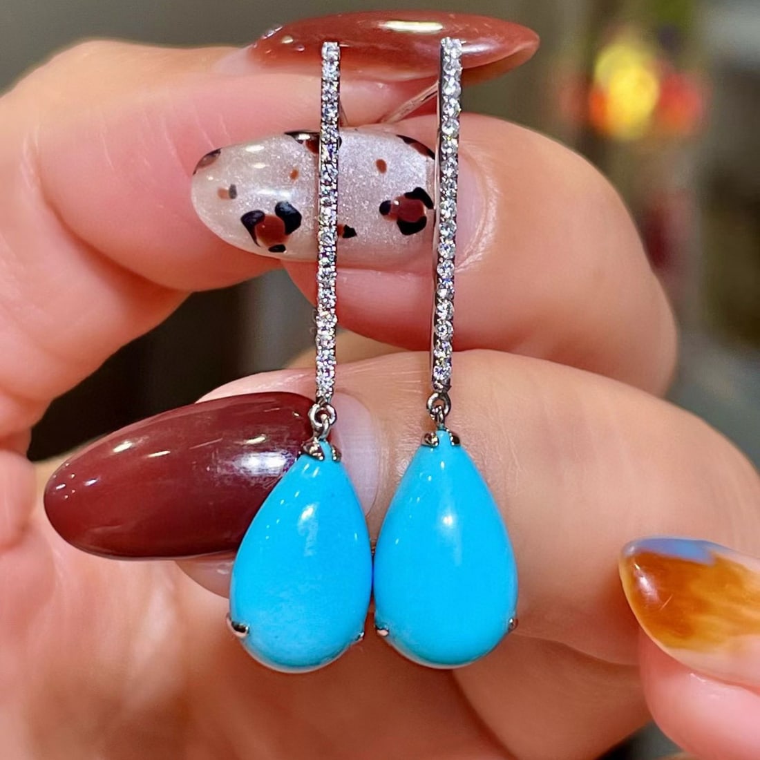 14k Gold 5.95 Ctw Natural Blue Turquoise & Diamond Earrings: Ref:231117060 // gold content:14k gold // main gemstone:blue turquoise // shape:pear // carat weight:5. 75ct // color:blue // treatment:natural // // adjacent gemstone 2 : diamond // shape:round //