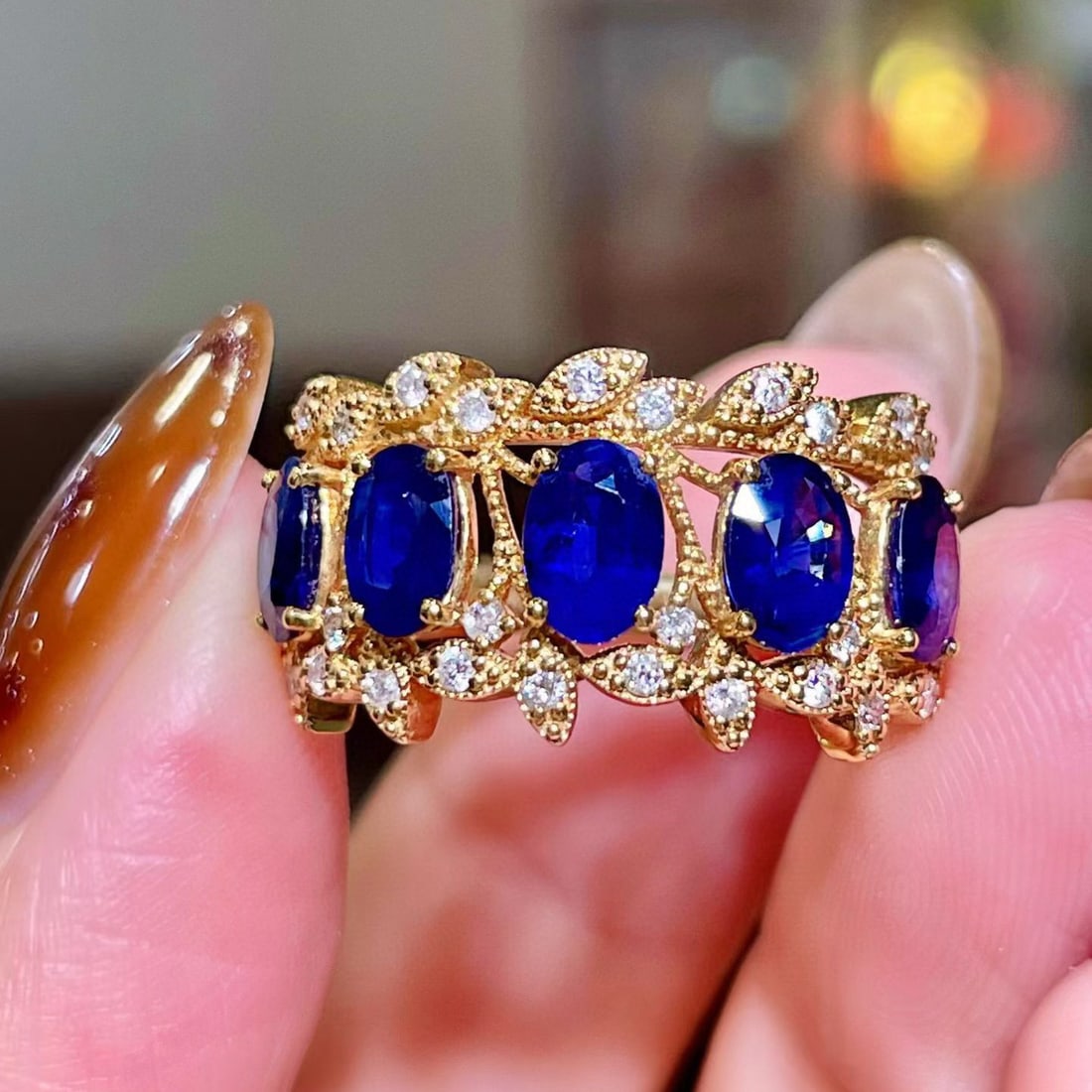 14k Gold 2.57 Ctw Natural Sapphire & Diamond Ring: Ref:231117115 // gold content:14k gold // ring size:7. 25us // // main gemstone:sapphire // shape:oval // carat weight:2. 34ct // color:blue // treatment:natural // // adjacent gemstone 2 :