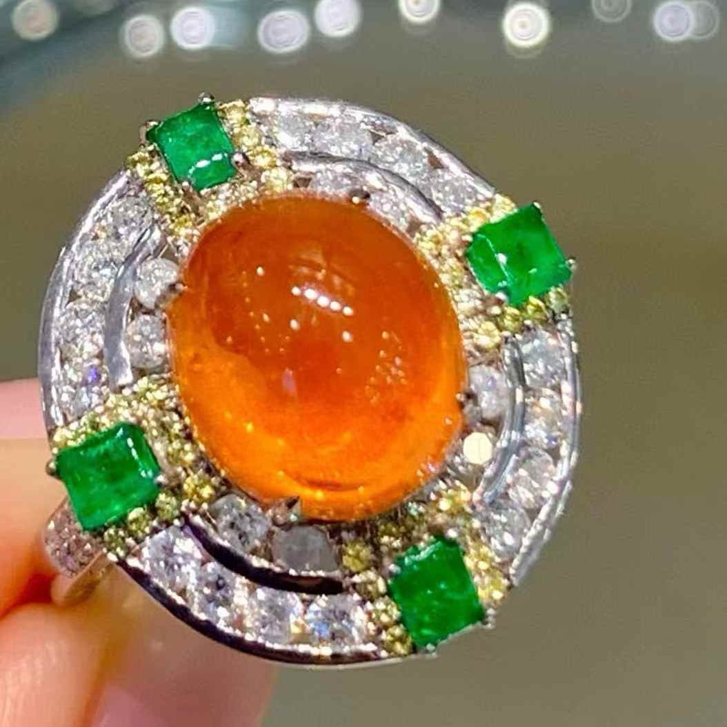 14k Gold 6.28 Ct Natural Spessartine & Diamond Ring: Ref:231117145 // gold content:14k gold // ring size:7. 25us // // main gemstone:spessartine // shape:oval // carat weight:6. 28ct // color:orange // treatment:natural // // adjacent gemstone 2 :
