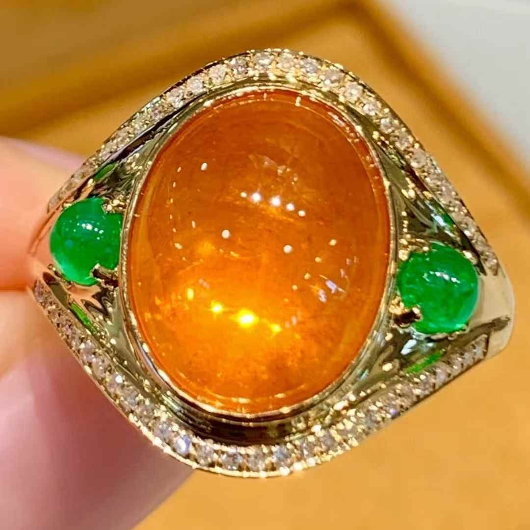 14k Gold 8.9 Ct Natural Spessartine & Diamond Ring: Ref:231117188 // gold content:14k gold // ring size:7. 25us // // main gemstone:spessartine // shape:oval // carat weight:8. 9ct // color:orange // treatment:natural // // adjacent gemstone 2 :