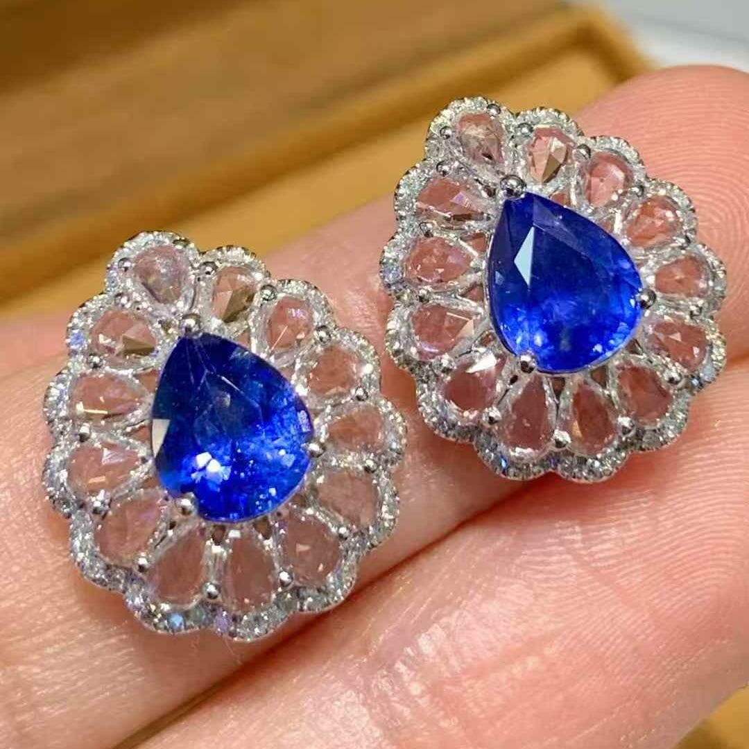 14k Gold 2.7 Ct Natural Sapphire & Diamond & Sapphire Earrings: Ref:231117206 // gold content:14k gold // main gemstone:sapphire // shape:pear // carat weight:2. 7ct // color:blue // treatment:natural // // adjacent gemstone 2 : diamond // shape:round // clarity g
