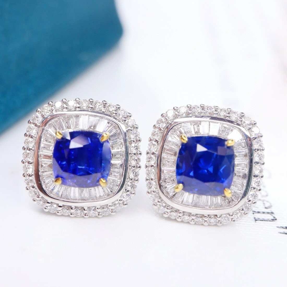14k Gold 2.53 Ctw Natural Sapphire & Diamond Earrings: Ref:231117210 // gold content:14k gold // main gemstone:sapphire // shape:cushion // carat weight:2. 00ct // color:royal blue // treatment:natural // // adjacent gemstone 2 : diamond //