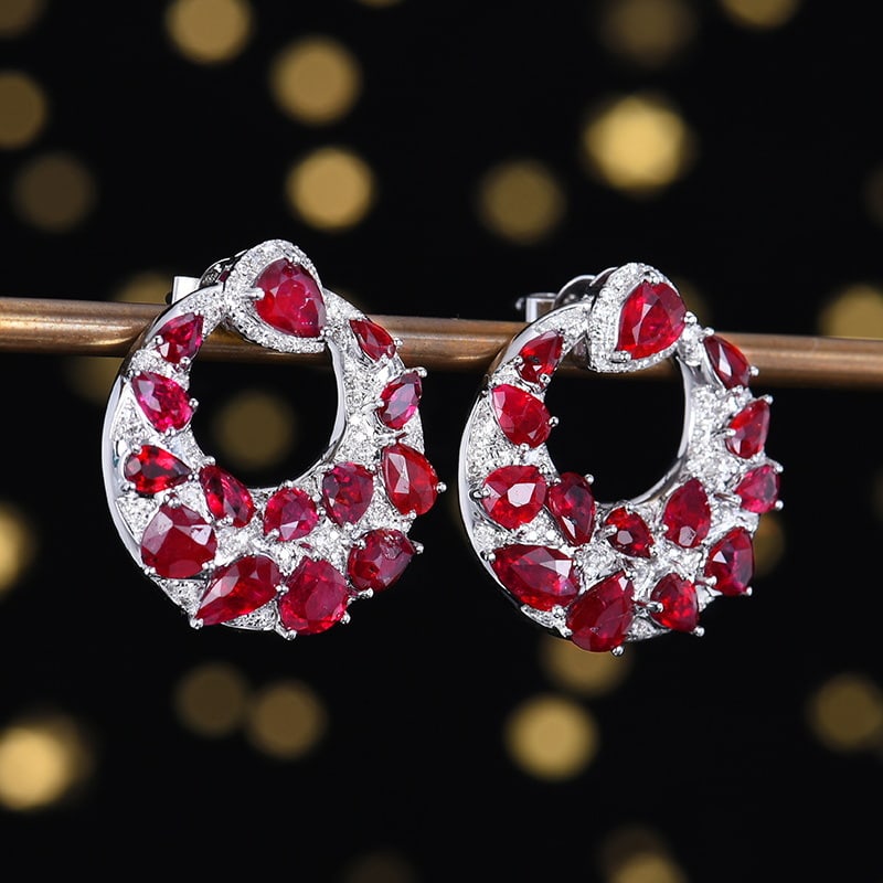 14k Gold 6.61 Ctw Natural Ruby & Diamond Earrings: Ref:231118082 // gold content:14k gold // main gemstone:ruby // shape:pear // carat weight:6. 28ct // color:pigeonblood red // treatment:natural // // adjacent gemstone 2 : diamond // number of