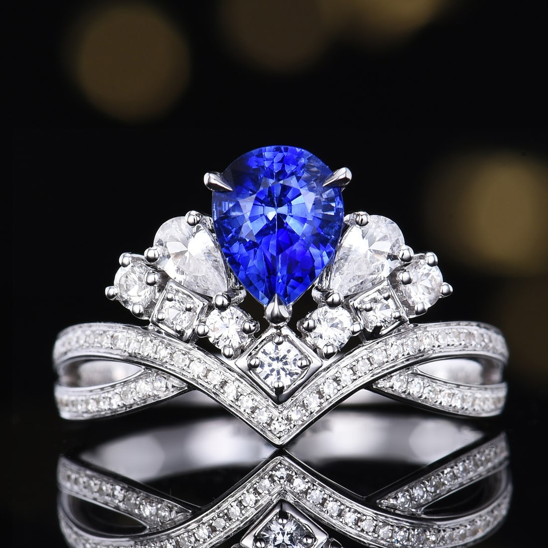 14k Gold 1.33 Ctw Natural Sapphire & Diamond Ring: Ref:231118084 // gold content:14k gold // ring size:7. 25us // // main gemstone:sapphire // shape:pear // carat weight:1. 18ct // color:blue // treatment:natural // // adjacent gemstone 2 :