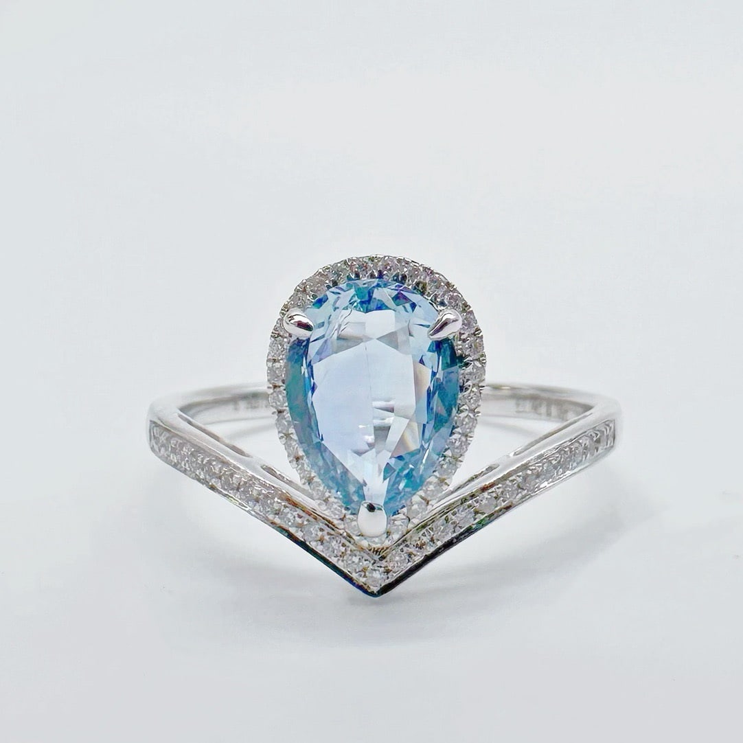 14k Gold 1.31 Ctw Natural Sapphire & Diamond Ring: Ref:231118117 // gold content:14k gold // ring size:7. 25us // // main gemstone:sapphire // shape:pear // carat weight:1. 14ct // color:blue // treatment:natural // // adjacent gemstone 2 :