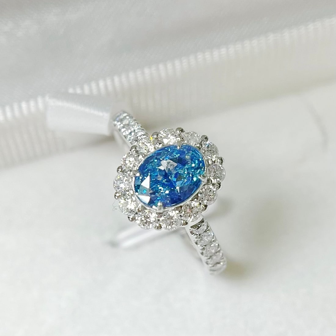 14k Gold 1.67 Ctw Natural Blue Diamond & Diamond Ring: Ref:231118263 // gold content:14k gold // ring size:7. 25us // // main gemstone:blue diamond // shape:oval // carat weight:1. 00ct // color:blue // treatment:natural // // adjacent gemstone 2 :