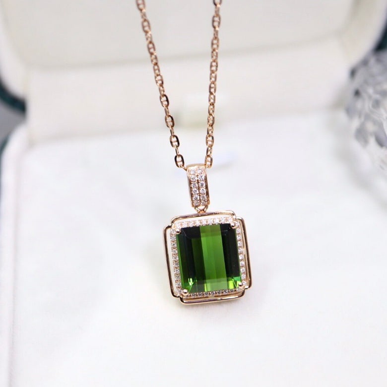 14k Gold 6.17 Ctw Natural Tourmaline & Diamond Pendant( Without Chain ): Ref:231118274 // gold content:14k gold // main gemstone:tourmaline // shape:octagonal // carat weight:6ct // color:green // treatment:natural // // adjacent gemstone 2 : diamond // shape:round //