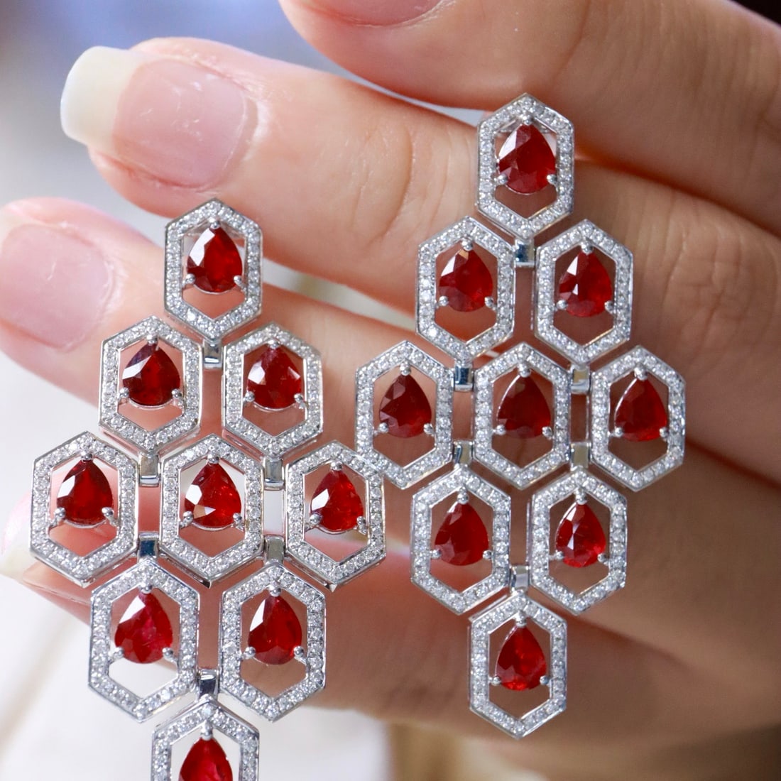 14k Gold 7.97 Ctw Natural Ruby & Lab Grown Diamond Earrings: Ref:231118286 // gold content:14k gold // main gemstone:ruby // shape:pear // carat weight:6. 57ct // color:red // treatment:natural // // adjacent gemstone 2 : lab grown diamond // shape:round //