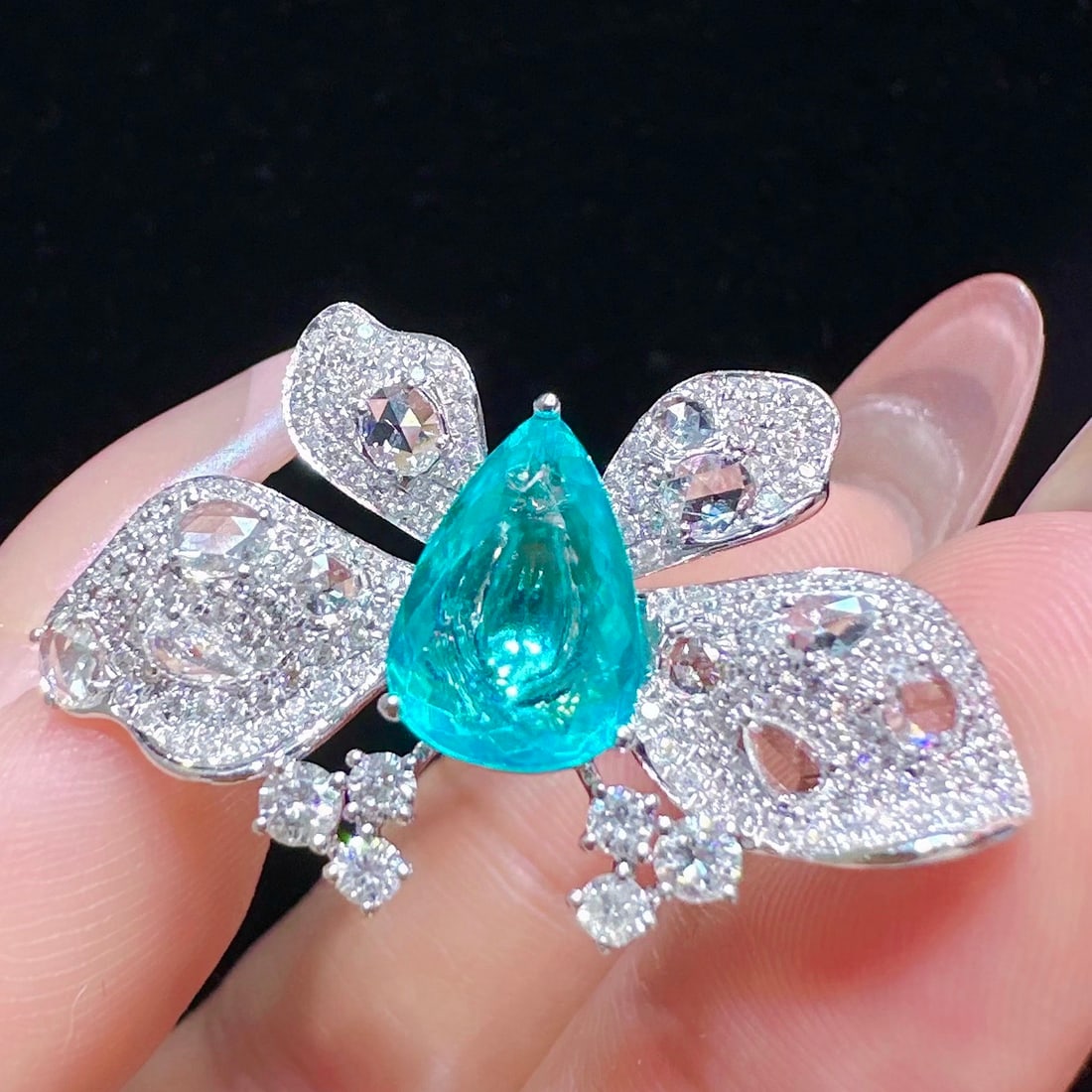14k Gold 3.30 Ctw Natural Paraiba Tourmaline & Diamond Ring: Ref:231118329 // gold content:14k gold // ring size:7. 25us // // main gemstone:paraiba tourmaline // shape:pear // carat weight:2. 01ct // color:blue // treatment:natural // // adjacent gemstone 2 :
