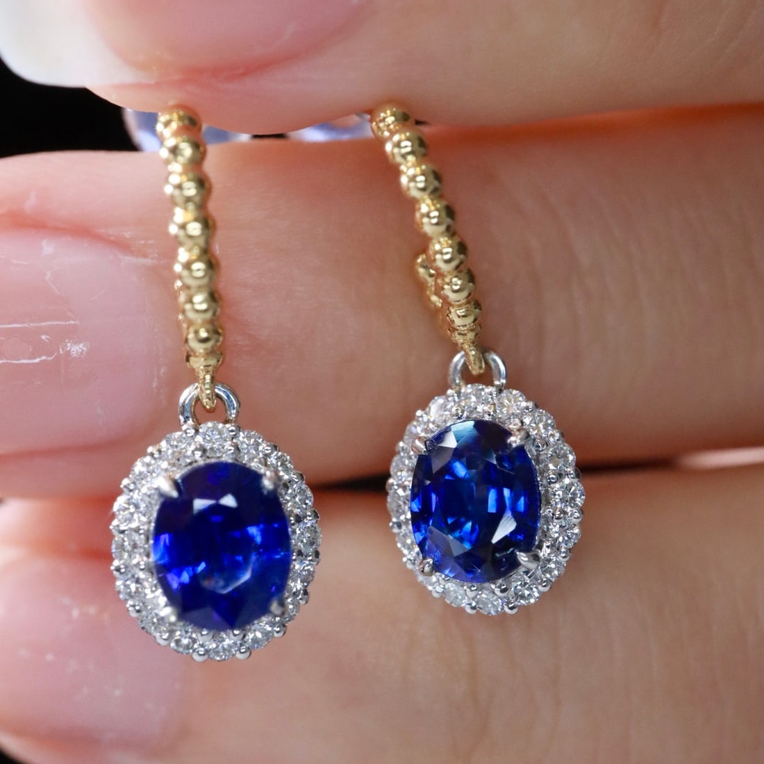 14k Gold 1.77 Ctw Natural Sapphire & Diamond Earrings: Ref:231118335 // gold content:14k gold // main gemstone:sapphire // shape:oval // carat weight:1. 45ct // color:royal blue // treatment:natural // // adjacent gemstone 2 : diamond // shape:round //