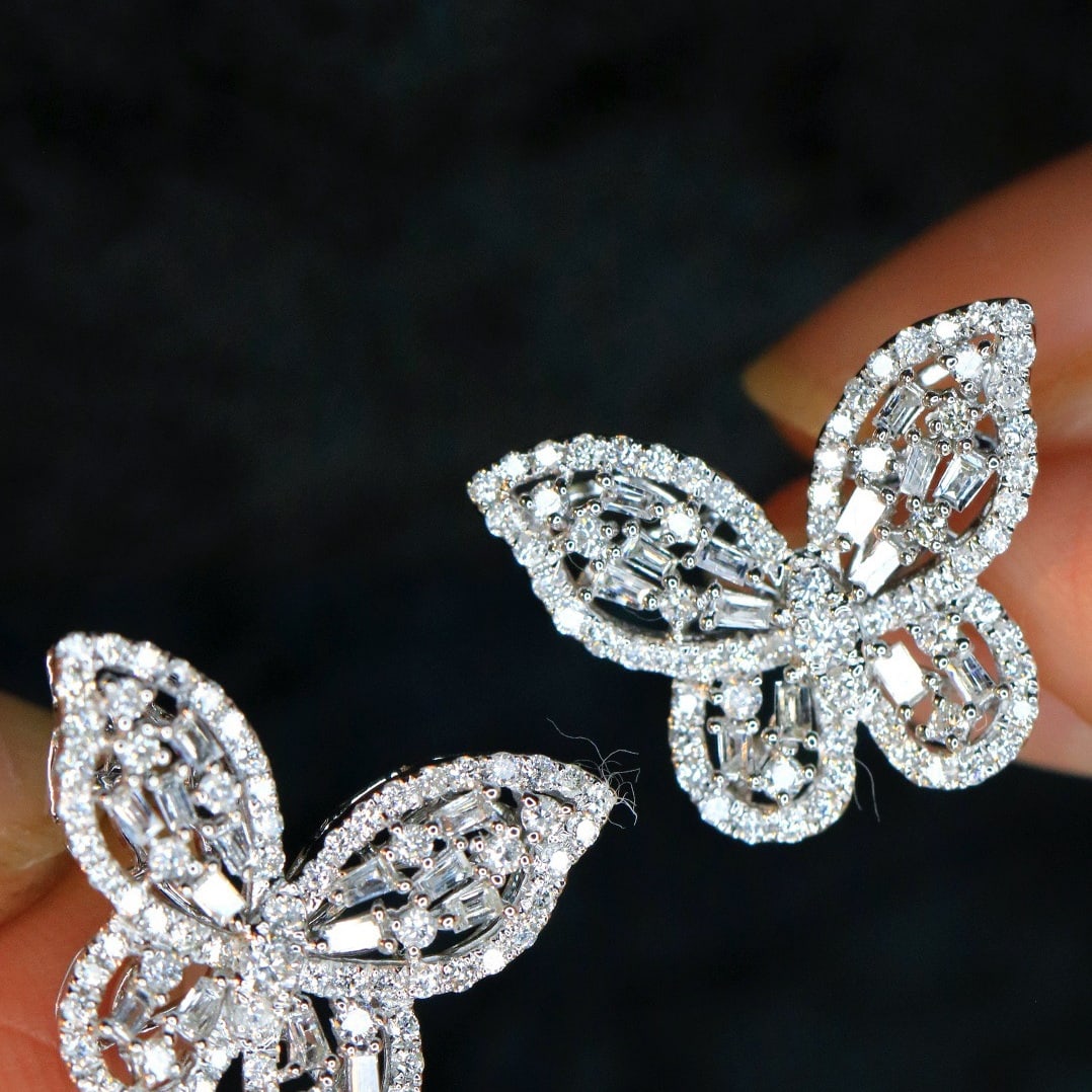 14k Gold 0.88 Ct Natural H Diamond & Butterfly Earrings: Ref:231118348 // gold content:14k gold // main gemstone:diamond // shape:multiple // carat weight:0. 88ct // clarity grade:vs-si // color:h // treatment:natural // Condition: NewLow Estimate: