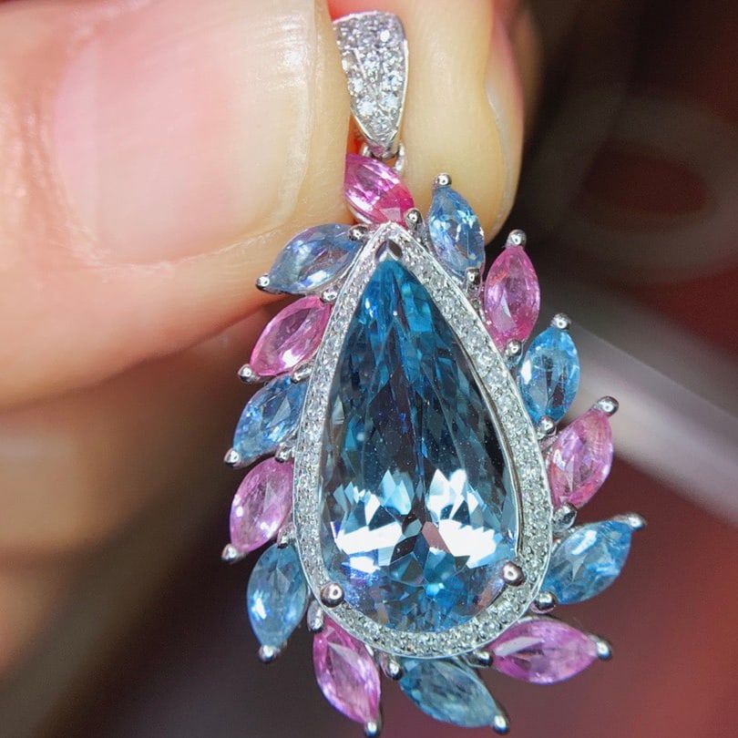 14k Gold 9.85 Ctw Natural Aquamarine & Sapphire Pendant( Without Chain ): Ref:231118362 // gold content:14k gold // main gemstone:aquamarine // shape:pear // carat weight:6. 65ct // color:blue // treatment:natural // // adjacent gemstone 2 : sapphire & aquamarine //