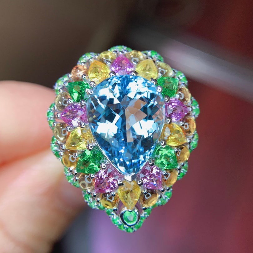 14k Gold 10.49 Ctw Natural Aquamarine & Sapphire & Tsavorite Ring: Ref:231118368 // gold content:14k gold // ring size:7. 25us // // main gemstone:aquamarine // shape:pear // carat weight:6. 39ct // color:blue // treatment:natural // // adjacent gemstone 2 :