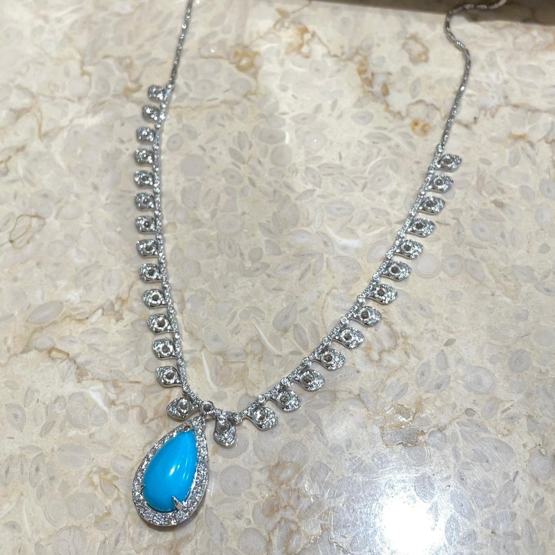 14k Gold 2.4 Ct Natural Blue Turquoise & Diamond & Sapphire Necklace: Ref:231118437 // gold content:14k gold // main gemstone:blue turquoise // shape:pear // carat weight:2. 4ct // color:blue // treatment:natural // // adjacent gemstone 2 : diamond // shape:round // cla