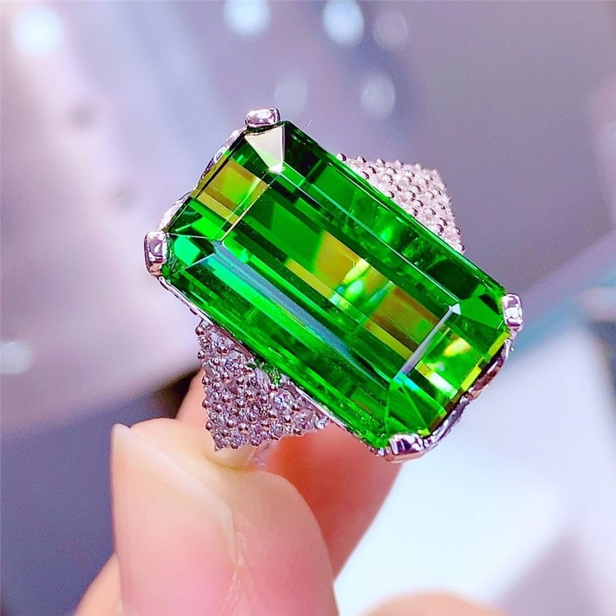 14k Gold 15.3 Ct Natural Tourmaline & Diamond Ring: Ref:230975031 // gold content:14k gold // ring size:7. 25us // // main gemstone:tourmaline // shape:octagonal // carat weight:15. 3ct // color:green // treatment:natural // // adjacent gemstone 2