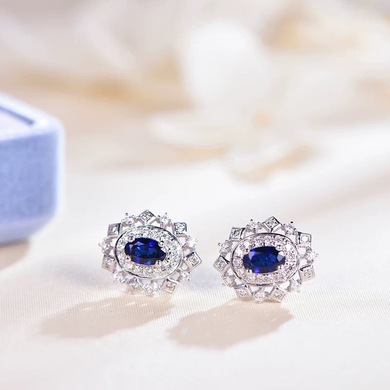 14k Gold 1.09 Ctw Natural Sapphire & Diamond Earrings: Ref:230975060 // gold content:14k gold // main gemstone:sapphire // shape:oval // carat weight:0. 77ct // color:blue // treatment:natural // // adjacent gemstone 2 : diamond // shape:round // carat