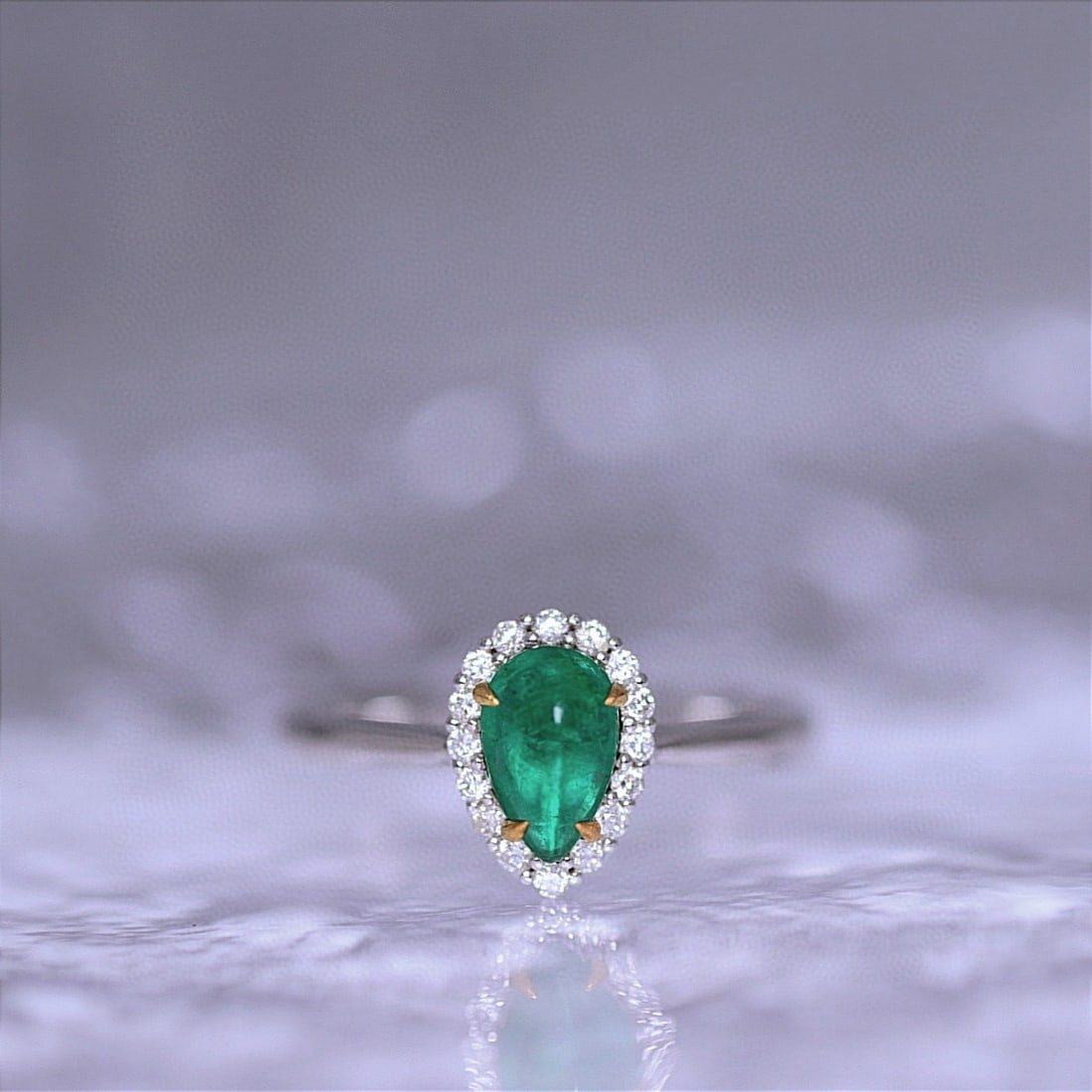 14k Gold 0.85 Ctw Natural Emerald & Diamond Ring: Ref:230975091 // gold content:14k gold // ring size:7. 25us // // main gemstone:emerald // shape:pear // carat weight:0. 69ct // color:green // treatment:natural // // adjacent gemstone 2 :