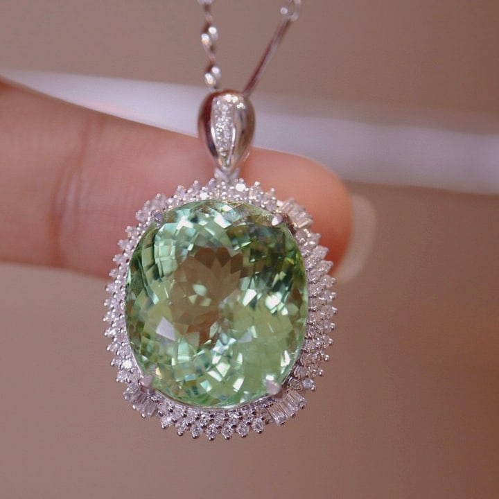 14k Gold 16.6 Ct Natural Tourmaline & Diamond Pendant( Without Chain ): Ref:230975115 // gold content:14k gold // main gemstone:tourmaline // shape:oval // carat weight:16. 6ct // color:green // treatment:natural // // adjacent gemstone 2 : diamond // number of stones:91