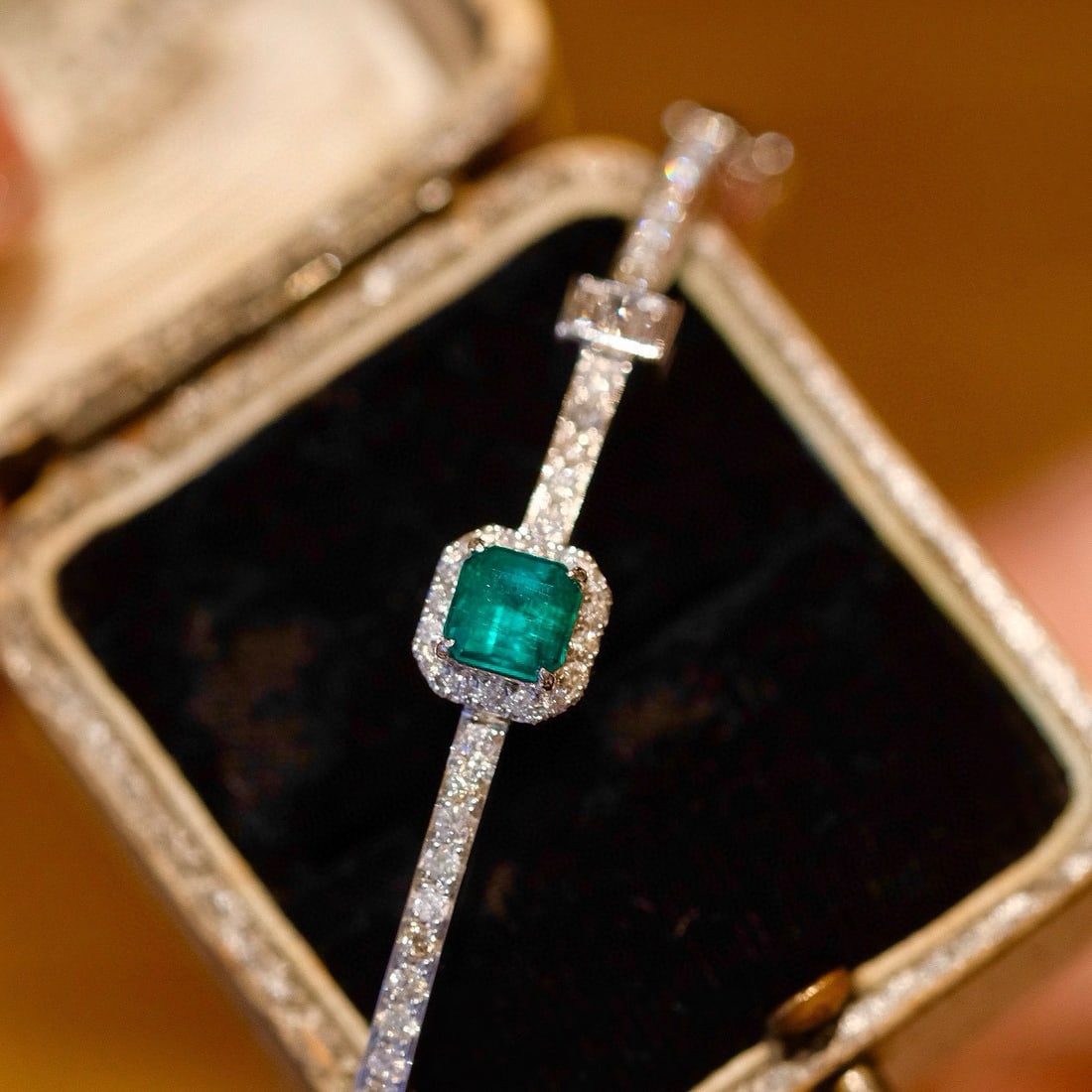 14k Gold 1.48 Ctw Natural Emerald & Diamond Bangle: Ref:230975175 // gold content:14k gold // main gemstone:emerald // shape:octagonal // carat weight:0. 68ct // color:green // treatment:natural // // adjacent gemstone 2 : diamond // shape:multiply