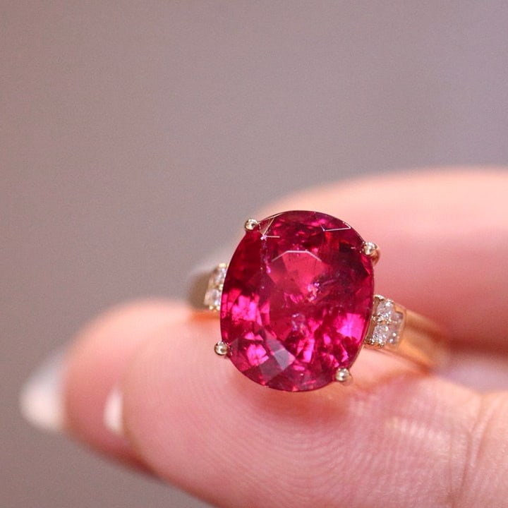 14k Gold 5.67 Ct Natural Tourmaline & Diamond Ring: Ref:230975216 // gold content:14k gold // ring size:7. 25us // // main gemstone:tourmaline // shape:oval // carat weight:5. 67ct // color:red // treatment:natural // // adjacent gemstone 2 :