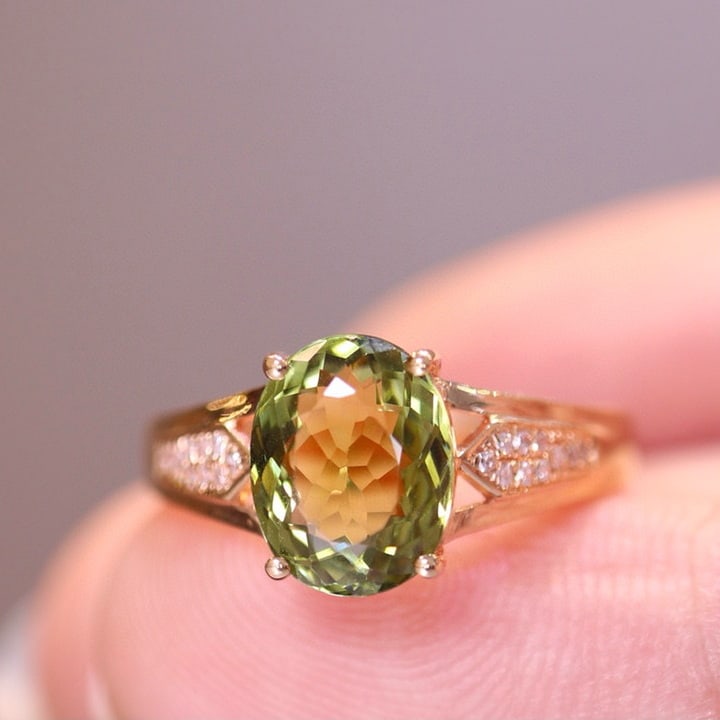14k Gold 2.78 Ct Natural Tourmaline & Diamond Ring: Ref:230975219 // gold content:14k gold // ring size:7. 25us // // main gemstone:tourmaline // shape:oval // carat weight:2. 78ct // color:green // treatment:natural // // adjacent gemstone 2 :