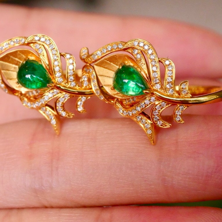 14k Gold 0.70 Ctw Vivid Green Natural Emerald & Diamond Ring: Ref:230975233 // gold content:14k gold // ring size:7. 25us // // main gemstone:emerald // shape:pear // carat weight:0. 51ct // color:vivid green // treatment:natural // // adjacent gemstone 2 :