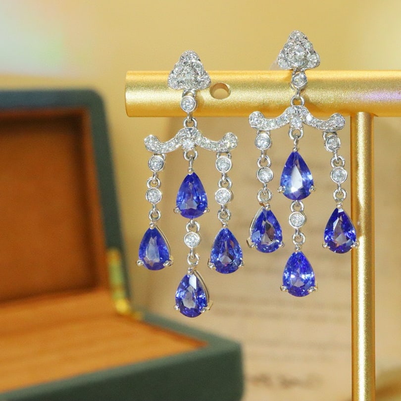 14k Gold 4.47 Ctw Natural Sapphire & Diamond Earrings: Ref:230976030 // gold content:14k gold // main gemstone:sapphire // shape:pear // carat weight:4. 16ct // color:cornflower blue // treatment:natural // // adjacent gemstone 2 : diamond // number of