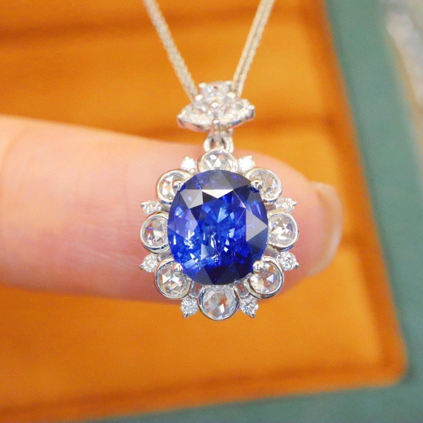 14k Gold 2.55 Ctw Natural Sapphire & Diamond Pendant( Without Chain ): Ref:230976033 // gold content:14k gold // main gemstone:sapphire // shape:oval // carat weight:2. 10ct // color:royal blue // treatment:natural // // adjacent gemstone 2 : diamond // number of