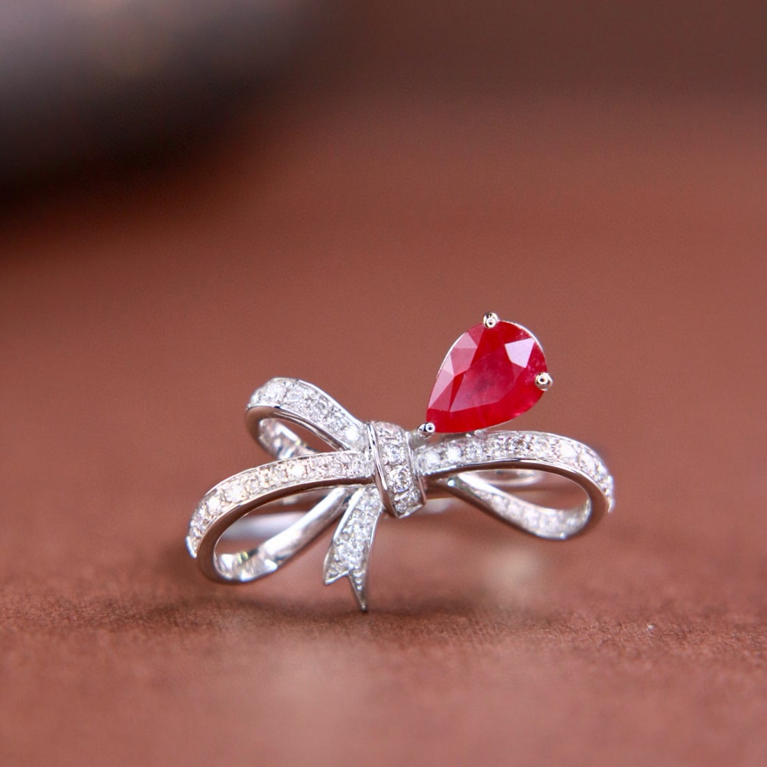 14k Gold 0.96 Ctw Natural Ruby & Diamond Ring: Ref:230976057 // gold content:14k gold // ring size:7. 25us // // main gemstone:ruby // shape:pear // carat weight:0. 78ct // color:pigeonblood red // treatment:natural // // adjacent gemstone 2 : dia