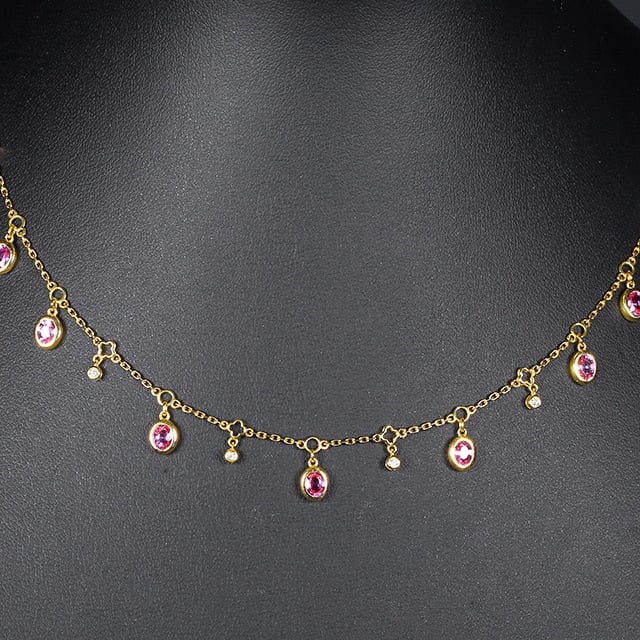 14k Gold 1.94 Ctw Natural Padparadscha Sapphire & Diamond Necklace: Ref:230976077 // gold content:14k gold // main gemstone:padparadscha sapphire // shape:oval // carat weight:1. 88ct // color:orangish pink // treatment:natural // // adjacent gemstone 2 : diamond