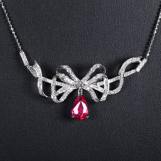 14k Gold 1.51 Ctw Natural Ruby & Diamond Necklace: Ref:230976091 // gold content:14k gold // main gemstone:ruby // shape:pear // carat weight:1. 05ct // color:pigeonblood red // treatment:natural // // adjacent gemstone 2 : diamond // number of