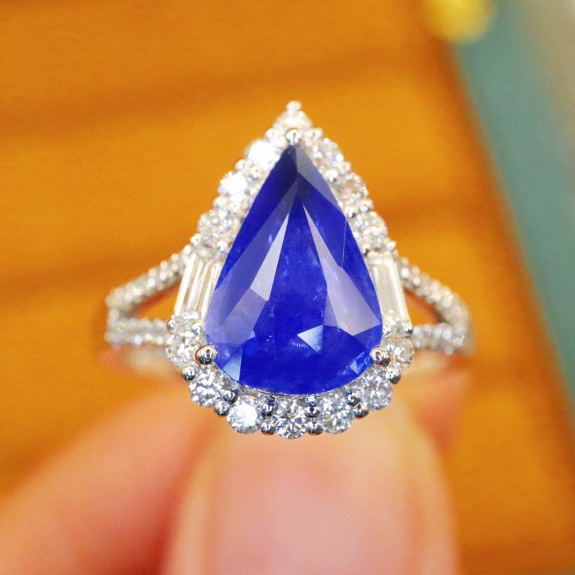 14k Gold 2.60 Ctw Natural Sapphire & Diamond Ring: Ref:230976126 // gold content:14k gold // ring size:7. 25us // // main gemstone:sapphire // shape:pear // carat weight:2. 15ct // color:cornflower blue // treatment:natural // // adjacent gemstone