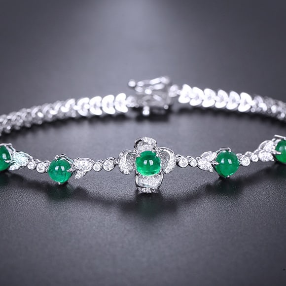 14k Gold 3.47 Ctw Natural Emerald & Diamond Bracelet: Ref:230976195 // gold content:14k gold // main gemstone:emerald // shape:round // carat weight:2. 7ct // color:green // treatment:natural // cut grade:g // // adjacent gemstone 2 : diamond //