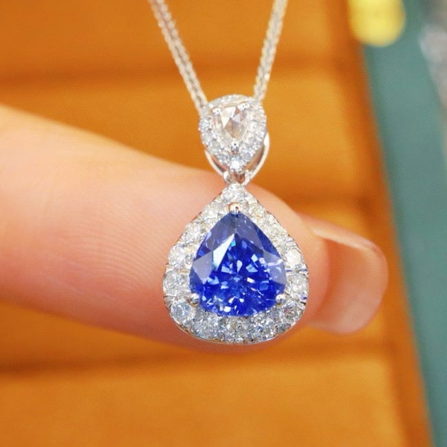 14k Gold 1.57 Ctw Natural Sapphire & Diamond Pendant( Without Chain ): Ref:230976221 // gold content:14k gold // main gemstone:sapphire // shape:pear // carat weight:1. 23ct // color:cornflower blue // treatment:natural // // adjacent gemstone 2 : diamond // number of