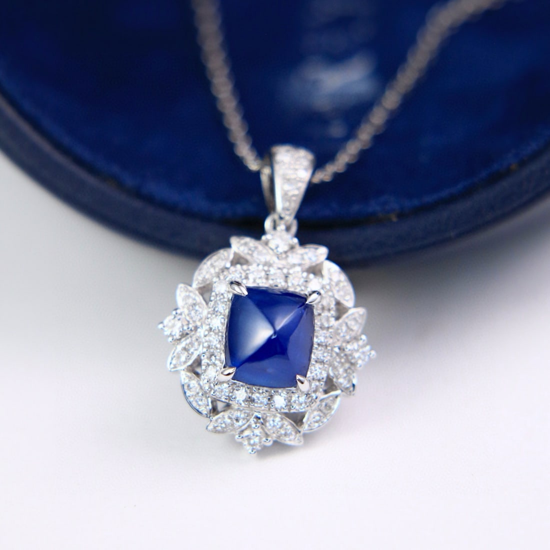 14k Gold 2.17 Ctw Natural Sapphire & Diamond Pendant( Without Chain ): Ref:230976271 // gold content:14k gold // main gemstone:sapphire // shape:suger-loaf // carat weight:1. 78ct // color:blue // treatment:natural // // adjacent gemstone 2 : diamond // shape:round //
