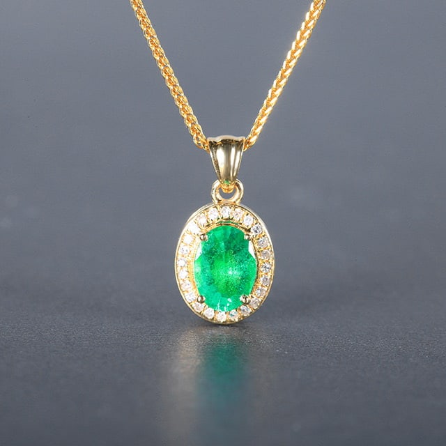 14k Gold 0.69 Ctw Vivid Green Natural Emerald & Diamond Pendant( Without Chain ): Ref:230976297 // gold content:14k gold // main gemstone:emerald // shape:oval // carat weight:0. 62ct // color:vivid green // treatment:natural // // adjacent gemstone 2 : diamond // number of