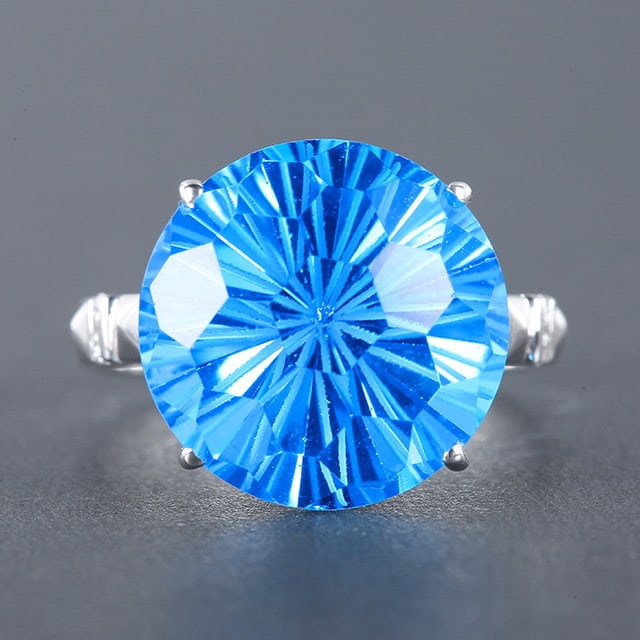 14k Gold 12.73 Ctw Natural Topaz & Diamond Ring: Ref:230976365 // gold content:14k gold // ring size:7. 25us // // main gemstone:topaz // shape:round // carat weight:12. 65ct // color:blue // treatment:natural // cut grade:g // // adjacent