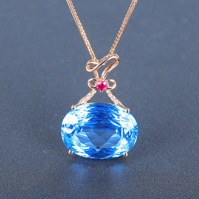 14k Gold 11.54 Ctw Natural Topaz & Diamond Pendant( Without Chain ): Ref:230976366 // gold content:14k gold // main gemstone:topaz // shape:oval // carat weight:11. 52ct // color:blue // treatment:natural // // adjacent gemstone 2 : diamond // number of stones:8 //
