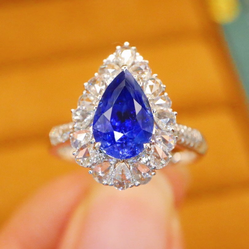 14k Gold 2.54 Ctw Natural Sapphire & Diamond Ring: Ref:230976376 // gold content:14k gold // ring size:7. 25us // // main gemstone:sapphire // shape:pear // carat weight:2. 03ct // color:royal blue // treatment:natural // // adjacent gemstone 2 :