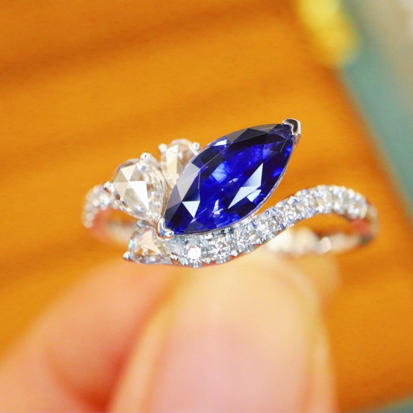 14k Gold 1.29 Ctw Natural Sapphire & Diamond Ring: Ref:230976385 // gold content:14k gold // ring size:7. 25us // // main gemstone:sapphire // shape:marquise // carat weight:1. 01ct // color:royal blue // treatment:natural // // adjacent gemstone