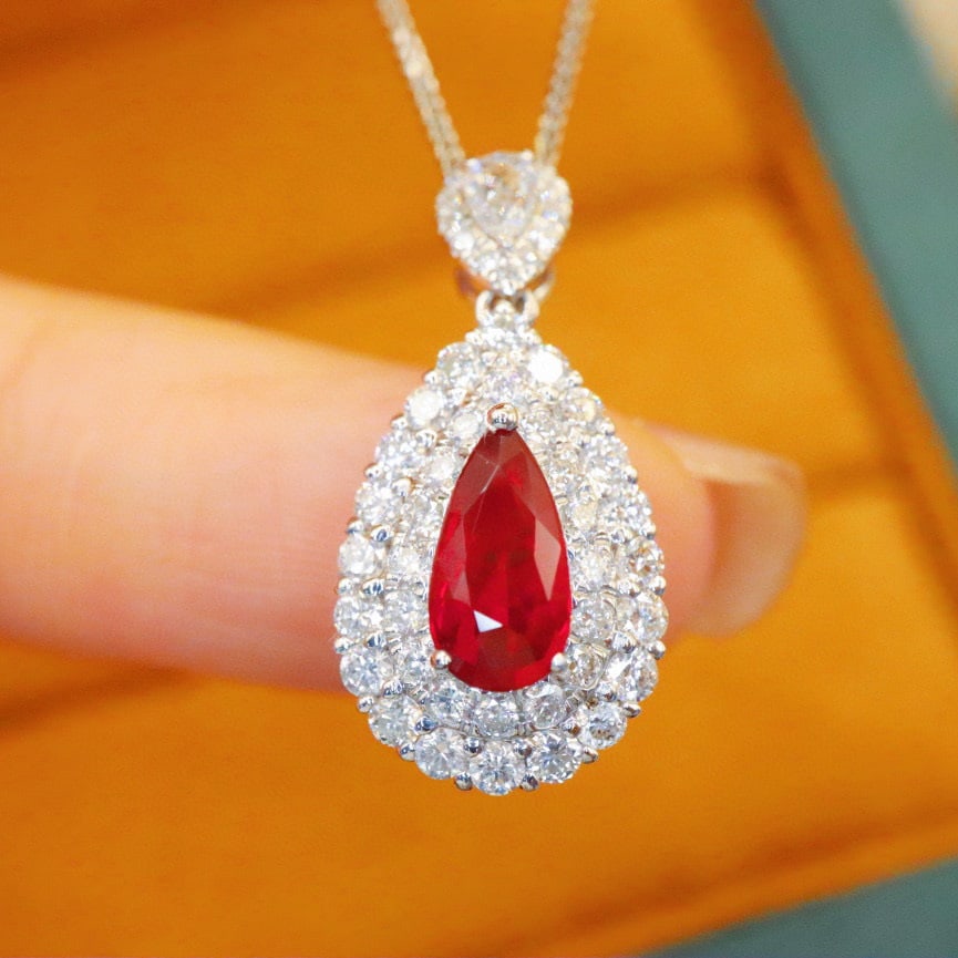 14k Gold 1.71 Ctw Natural Ruby & Diamond Pendant( Without Chain ): Ref:230976404 // gold content:14k gold // main gemstone:ruby // shape:pear // carat weight:1. 03ct // color:pigeonblood red // treatment:natural // // adjacent gemstone 2 : diamond // number of