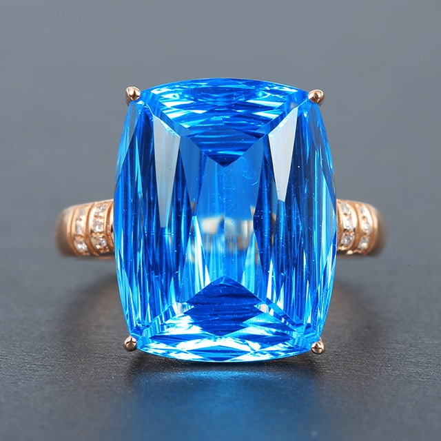 14k Gold 12.35 Ctw Natural Topaz & Diamond Ring: Ref:230976409 // gold content:14k gold // ring size:7. 25us // // main gemstone:topaz // shape:cushion // carat weight:12. 3ct // color:blue // treatment:natural // // adjacent gemstone 2 :