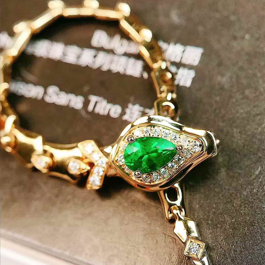 14k Gold 0.30 Ctw Vivid Green Natural Emerald & Diamond Ring/pendant( Without Chain ): Ref:230976450 // gold content:14k gold // ring size:adjustable // // main gemstone:emerald // shape:pear // carat weight:0. 23ct // color:vivid green // treatment:natural // // adjacent gemstone 2