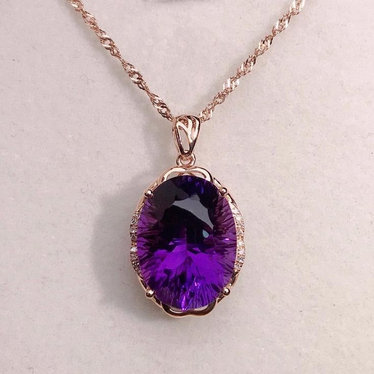 14k Gold 10.00 Ctw Natural Amethyst & Diamond Pendant( Without Chain ): Ref:231133024 // gold content:14k gold // main gemstone:amethyst // shape:oval // carat weight:9. 95ct // color:purple // treatment:natural // // adjacent gemstone 2 : diamond // number of