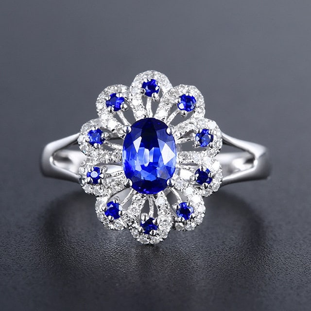 14k Gold 0.90 Ctw Natural Sapphire & Sapphire Ring: Ref:231133028 // gold content:14k gold // ring size:7. 25us // // main gemstone:sapphire // shape:oval // carat weight:0. 68ct // color:blue // treatment:natural // // adjacent gemstone 2 :
