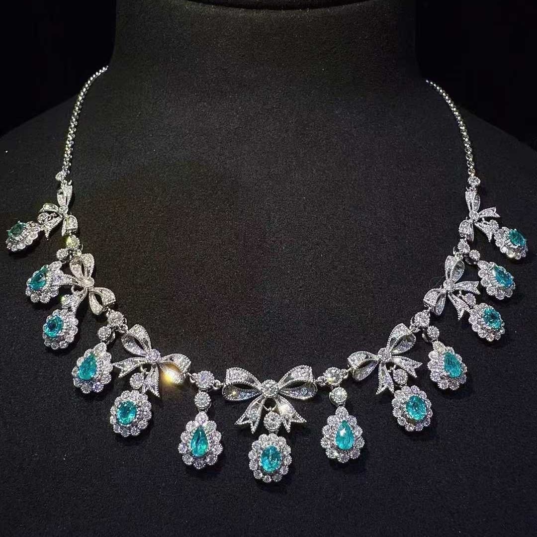 14k Gold 5.93 Ctw Natural Paraiba Tourmaline & Diamond Necklace: Ref:231133056 // gold content:14k gold // main gemstone:paraiba tourmaline // shape:multiple // carat weight:2. 29ct // color:blue // treatment:natural // // adjacent gemstone 2 : diamond // shape:rou